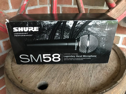 vintage Shure SM58 cardioid dynamic vocal microphone